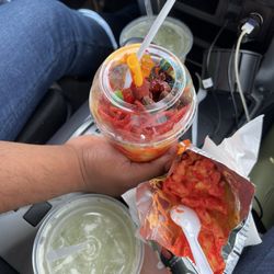 Raspadin - Deli Mango, Agua de pepino con limón & hot Cheetos with cheese.