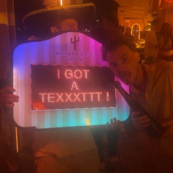 Restaurant Rainbow - We got to choose what our sign said when the bottle were brought out! - Restaurants Near Me - Saint Martin, 81