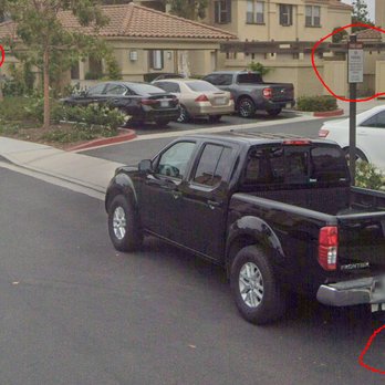 San Mateo Apartment Homes - apartment has painted parking spaces in fire lane - residents reasonably assume they can park there until told otherwise - Apartments Near Me - Irvine, California