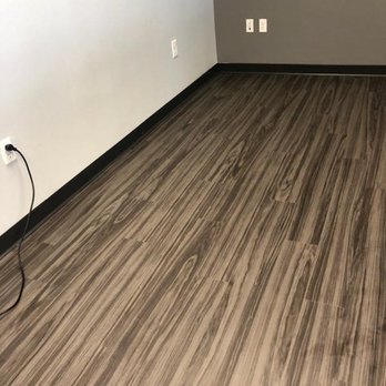 Harry's Carpets - a room with a hard wood floor - Flooring Near Me - Vacaville, California Harry's Carpets - a room with a hard wood floor - Flooring Near Me - Vacaville, California