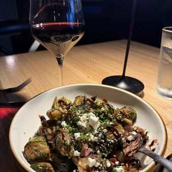 Vangel's Restaurant & Bar - Brussel spouts and very light wine pour for $14. - Bars Near Me - Saint Louis, Missouri