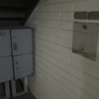 US Post Office - 1st photo. Bare wall where the outgoing mail box used to be. - Post Offices Near Me - Phoenix, Arizona