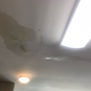 Intouch Property Management Services - ceiling in kitchen from 2nd flood from 1 year lease - Property Management Near Me - Decatur, Georgia Intouch Property Management Services - ceiling in kitchen from 2nd flood from 1 year lease - Property Management Near Me - Decatur, Georgia