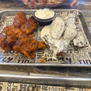 Tallowing - traditional wings... half in buffalo, half in parmesan sauce. - Chicken Wings Near Me - Glenview, Illinois Tallowing - traditional wings... half in buffalo, half in parmesan sauce. - Chicken Wings Near Me - Glenview, Illinois