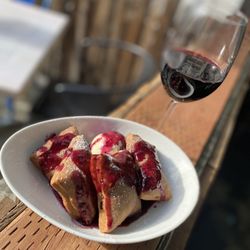 EJ Phair Alehouse & Pub: Alamo - Blueberry beignets with a blueberry compote