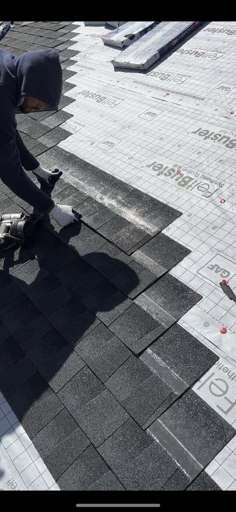 Slide of Akurate Roofing Group