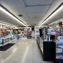 Cigarettes & Cigars For Less - Interior view