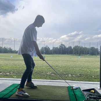 World of Golf - Second time at the driving range and probably doing it totally wrong, but he loves it! - Golf Near Me - Florence, Kentucky World of Golf - Second time at the driving range and probably doing it totally wrong, but he loves it! - Golf Near Me - Florence, Kentucky
