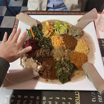 Delish Ethiopian Cuisine - Delish Combo - hand for size - Ethiopian Near Me - Seattle, Washington Delish Ethiopian Cuisine - Delish Combo - hand for size - Ethiopian Near Me - Seattle, Washington