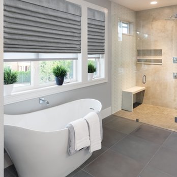 Brothers Blinds - a bathroom with a large bathtub - Shades & Blinds Near Me Brothers Blinds - a bathroom with a large bathtub - Shades & Blinds Near Me
