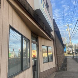 T J Nails - Outside (good parking next to building)