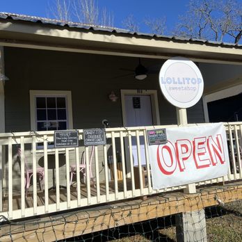 Lollitop Sweetshop - open sign on porch - Desserts Near Me - Round Top, Texas Lollitop Sweetshop - open sign on porch - Desserts Near Me - Round Top, Texas
