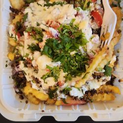 Taco N' Tento - These are carne asada fries with everything