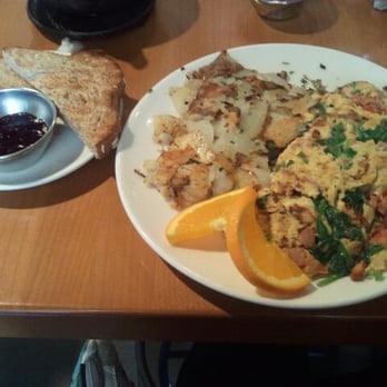 Plums Cafe - create-your-own omelette with tomatoes, spinach, wild mushrooms, ham, and peppers w. plum's hash & whole wheat toast - Breakfast & Brunch Near Me - Costa Mesa, California