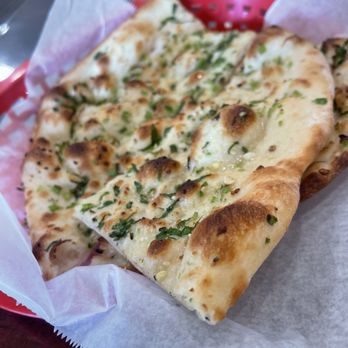 Azaad Indian Cuisine - Garlic Naan and Garlic Chili Naan - Indian Near Me - Riverside, California Azaad Indian Cuisine - Garlic Naan and Garlic Chili Naan - Indian Near Me - Riverside, California