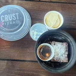 Brownie with ice cream packed for takeaway Brownie with ice cream packed for takeaway