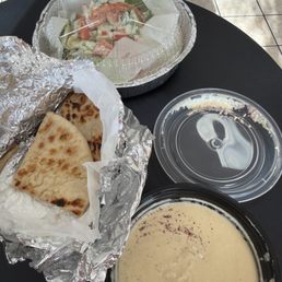 Hummus, pita, and a chicken gyro Hummus, pita, and a chicken gyro