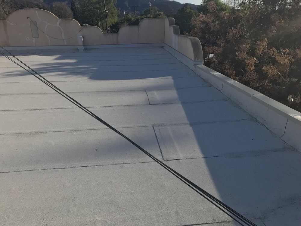 Slide of Aztec Roofing