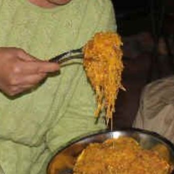 Antica Torre - Owner serving Tarajin with ragu. - Italian Near Me - Barbaresco, CN