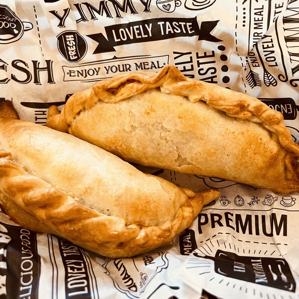El Gaucho Deli Cafe - Two Spicy Beef Empanadas ($2.99 each). - Peruvian Near Me - Estero, Florida El Gaucho Deli Cafe - Two Spicy Beef Empanadas ($2.99 each). - Peruvian Near Me - Estero, Florida