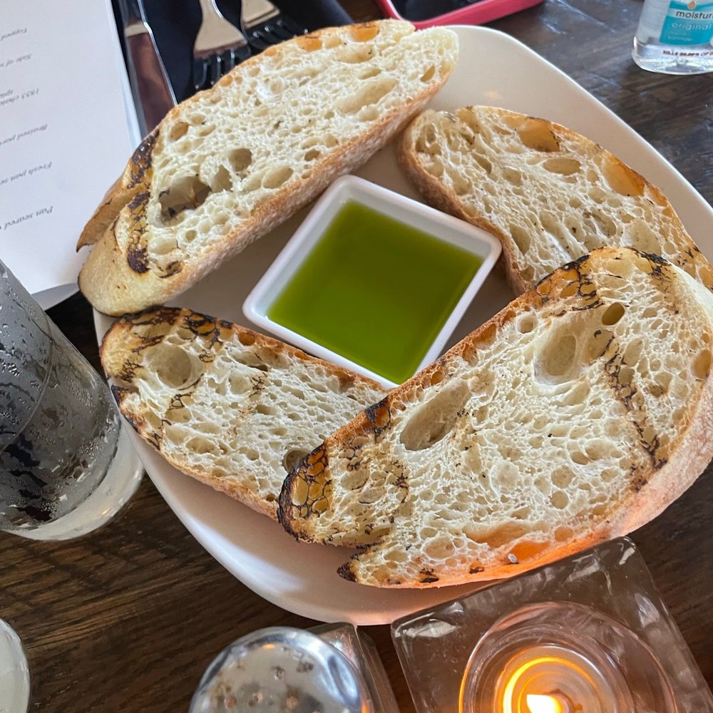Villa Harlequin | Italian - Homemade focaccia with olive oil - Italian Near Me - Lake Charles, Louisiana Villa Harlequin | Italian - Homemade focaccia with olive oil - Italian Near Me - Lake Charles, Louisiana