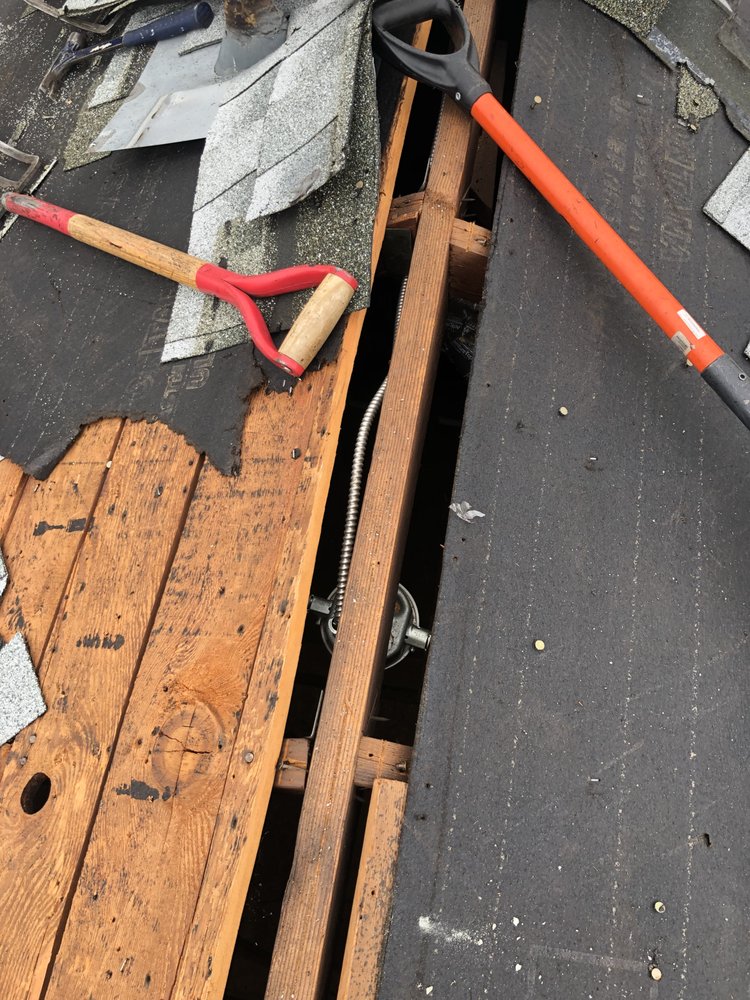 Slide of RC Roofing Co