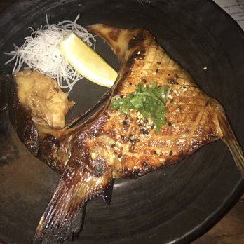Village Sake - Hamachi kama. Yellow tail grilled "collar". Scrap fish for US but delicious eating - Japanese Near Me - Fairfax, California Village Sake - Hamachi kama. Yellow tail grilled "collar". Scrap fish for US but delicious eating - Japanese Near Me - Fairfax, California