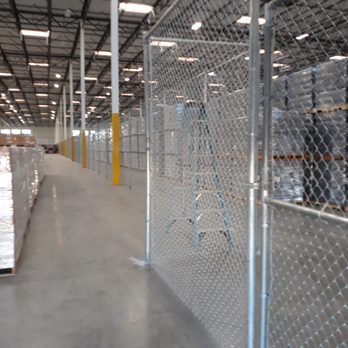 Fence Ellent - the inside of a warehouse - General Contractors Near Me