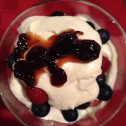 Artisan of Grand Haven - White chocolate parfait with berries & cherry flambé