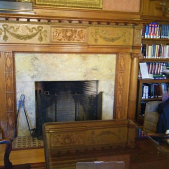 Millicent Library - Scruffy person next to cool fireplace - Libraries Near Me - Fairhaven, Massachusetts Millicent Library - Scruffy person next to cool fireplace - Libraries Near Me - Fairhaven, Massachusetts