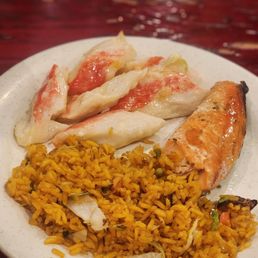 Way over cooked salmon, no flavor fried rice, and gross baked crab