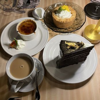 The Butcher's Cellar - Dessert courses (chocolate cake, blueberry crème brûlée, lemon butter cake) - Steakhouses Near Me - Woodway, Texas