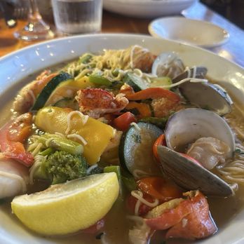 Blue Water Cafe - Dockside Seafood lobster, shrimp, scallops, clams, roasted vegetables, white wine sauce, over angel hair pasta - Seafood Near Me - Haven Beach, New Jersey