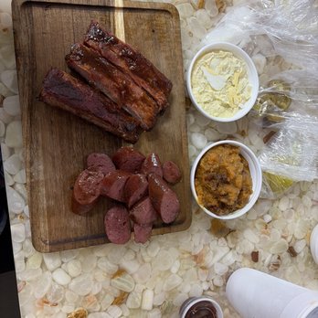 The Perfect Rack - Ribs, sausage, potato salad, and sweet potatoes. - Barbeque Near Me - South Houston, Texas