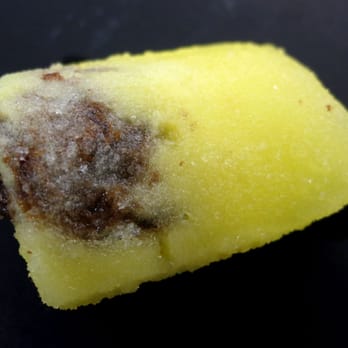 Ju-Mui Frozen Hawaiian Pops - Ju-Mui PIneapple with a whole Li Hing Mui Seed in it. - Shaved Ice Near Me