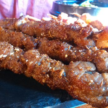Chat Bar - Close up of lamb skewers. - Bars Near Me - Unionville, Ontario Chat Bar - Close up of lamb skewers. - Bars Near Me - Unionville, Ontario