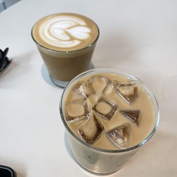Santo Coffee - Iced vanilla latte & oat milk cappuccino - Coffee & Tea Near Me - Seattle, Washington Santo Coffee - Iced vanilla latte & oat milk cappuccino - Coffee & Tea Near Me - Seattle, Washington