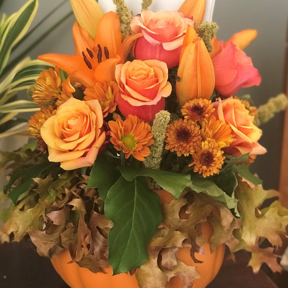 Autumn arrangement by Northgate Florist. AMAZING! This is the deluxe option. Totally worth the extra money.