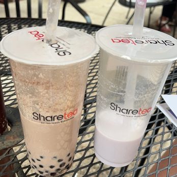 Sharetea - two cups of smoothie on a table - Bubble Tea Near Me - Louisville, Kentucky Sharetea - two cups of smoothie on a table - Bubble Tea Near Me - Louisville, Kentucky