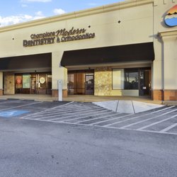 Champions Modern Dentistry and Orthodontics - Champions Modern Dentistry and Orthodontics parking lot view