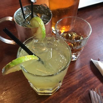 New Deck Tavern - Top left: Irish Mule ($7); Closest: Jameson Green Tea ($7); Right: Crown Royal Whiskey ($9) - American Near Me - Philadelphia, Pennsylvania