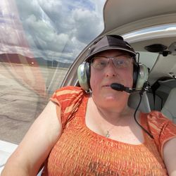 Jocelyn M. Abrams - Tall girl, tiny plane!