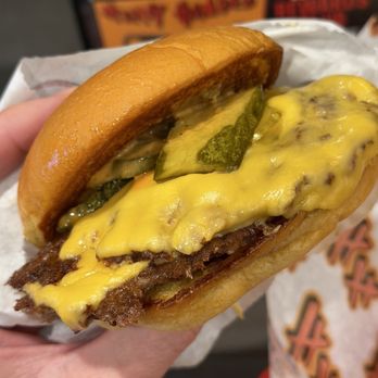Heavy Handed - Perfectly crispy patty and melted cheese on the smash burger - Burgers Near Me - Los Angeles, California Heavy Handed - Perfectly crispy patty and melted cheese on the smash burger - Burgers Near Me - Los Angeles, California
