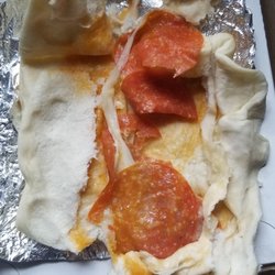 DeFelice Bros Pizza - That's all you get. Three super thin small pepperoni slices, tiny string of cheese, 95% underbaked bread.