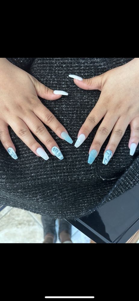 Nirvana Nails & Spa Logo