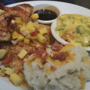 Cheddar's Scratch Kitchen - Grilled Tilipa topped with Shrimp & Mango Salsa served with loaded Idaho potatoes and broccoli cheese casserole. - American Near Me - Avon, Indiana Cheddar's Scratch Kitchen - Grilled Tilipa topped with Shrimp & Mango Salsa served with loaded Idaho potatoes and broccoli cheese casserole. - American Near Me - Avon, Indiana