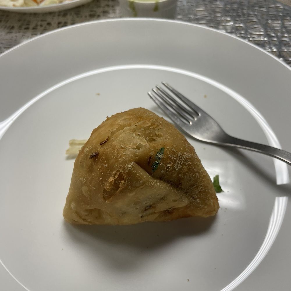 Samosas with mint sauce and tamarind sauce Samosas with mint sauce and tamarind sauce