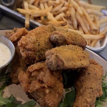 Station 16 - Lemon pepper wings with a side of fries! Delicious!! - Seafood Near Me - Sacramento, California Station 16 - Lemon pepper wings with a side of fries! Delicious!! - Seafood Near Me - Sacramento, California