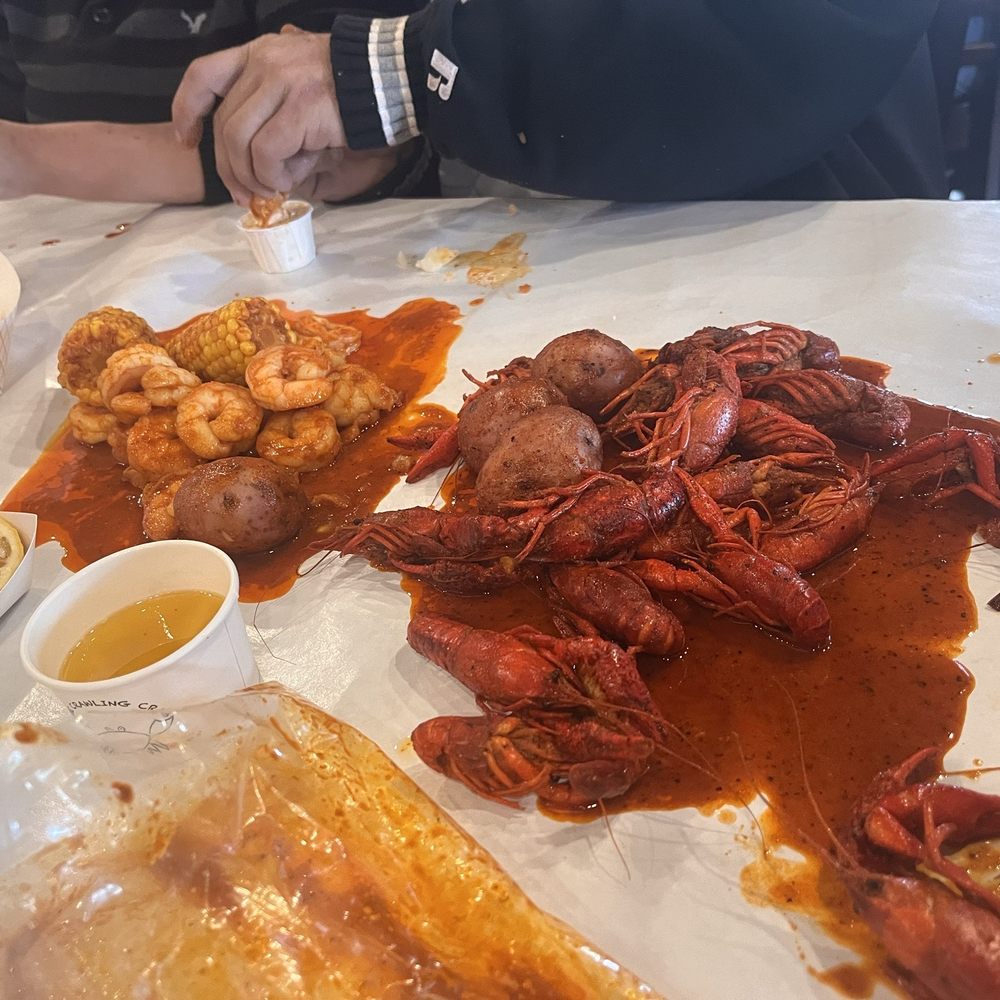 Mild crawfish, shrimp, garlic butter, potatoes and corn Mild crawfish, shrimp, garlic butter, potatoes and corn