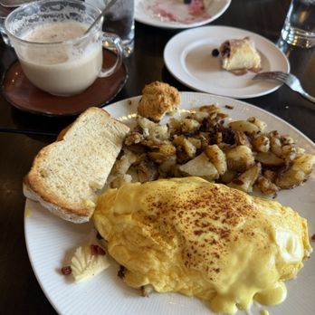 Josef's Vienna Bakery & Cafe - Bacon potato omelette (mixed berry crepe in the background) - Bakeries Near Me - Reno, Nevada Josef's Vienna Bakery & Cafe - Bacon potato omelette (mixed berry crepe in the background) - Bakeries Near Me - Reno, Nevada